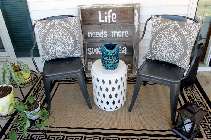 metal chairs outdoors on a porch