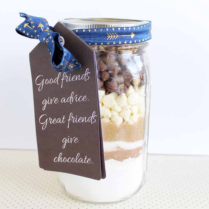 triple chocolate chip cookies ingredients in a jar ready for gifting