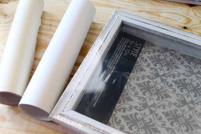 Supplies needed to make this money shadowbox graduation gift.