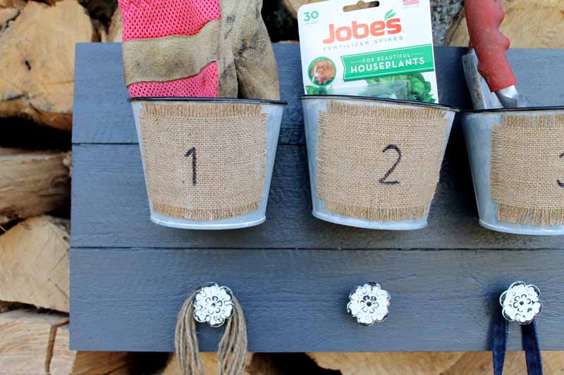DIY Garden Tool Organizer Make this garden tool organizer to get organized outdoors or in the garage!