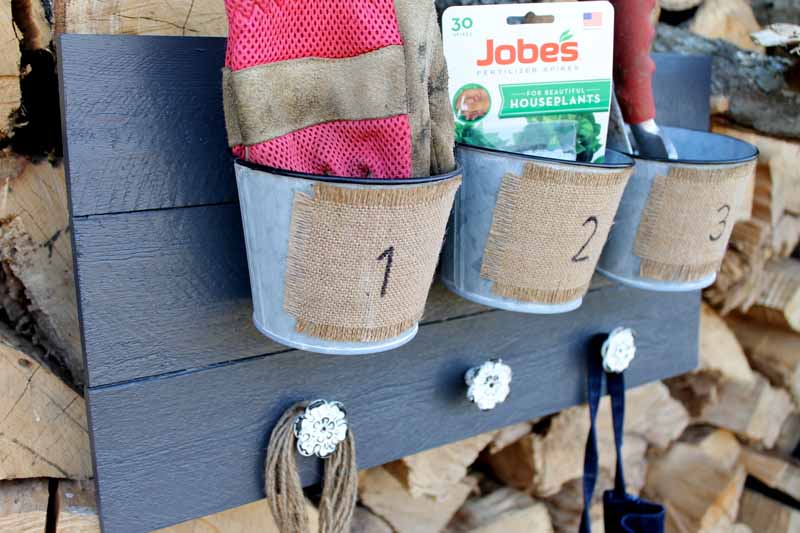 one storage rack with metal buckets 