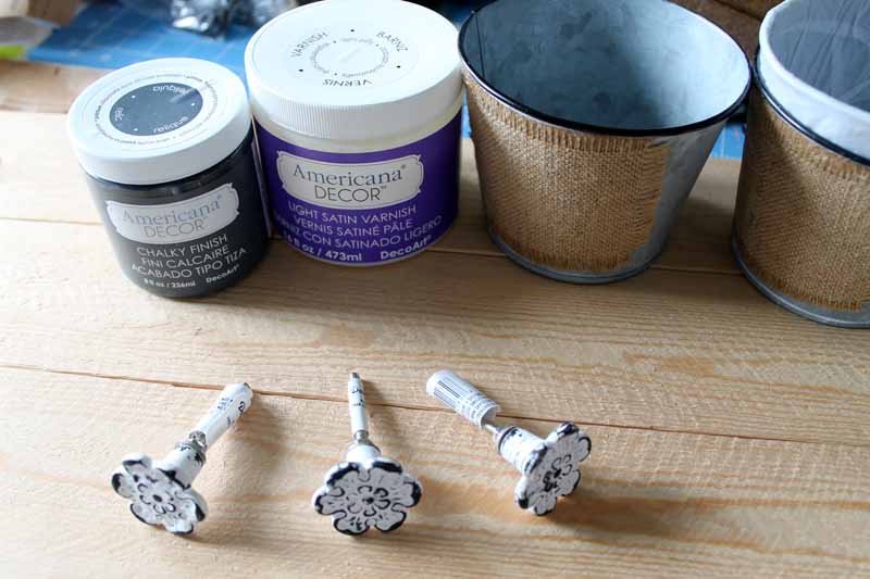 DIY Organizer Rack three knobs with buckets and paint