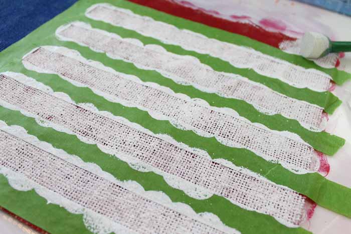 painting white stripes on the flag