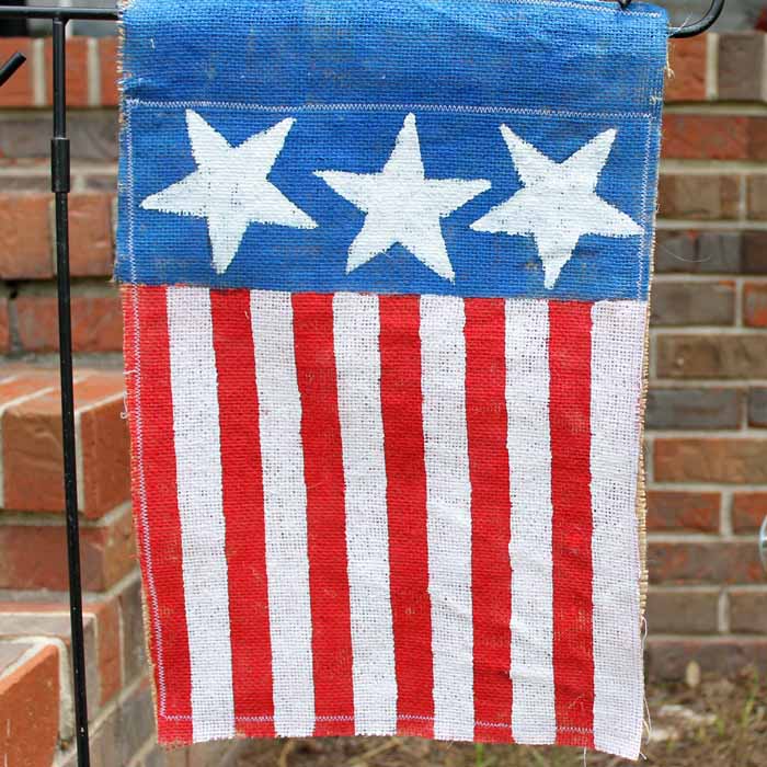 This burlap garden flag with american flag print