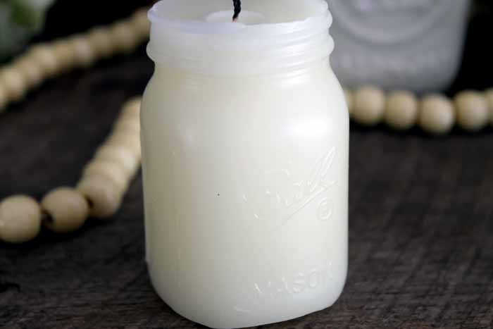 mason jar shaped candle on display