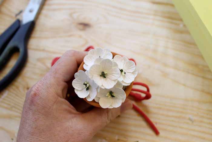 Make this DIY spring decor from clay pots!