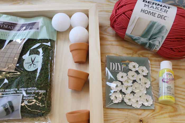 Make this DIY spring decor from clay pots!