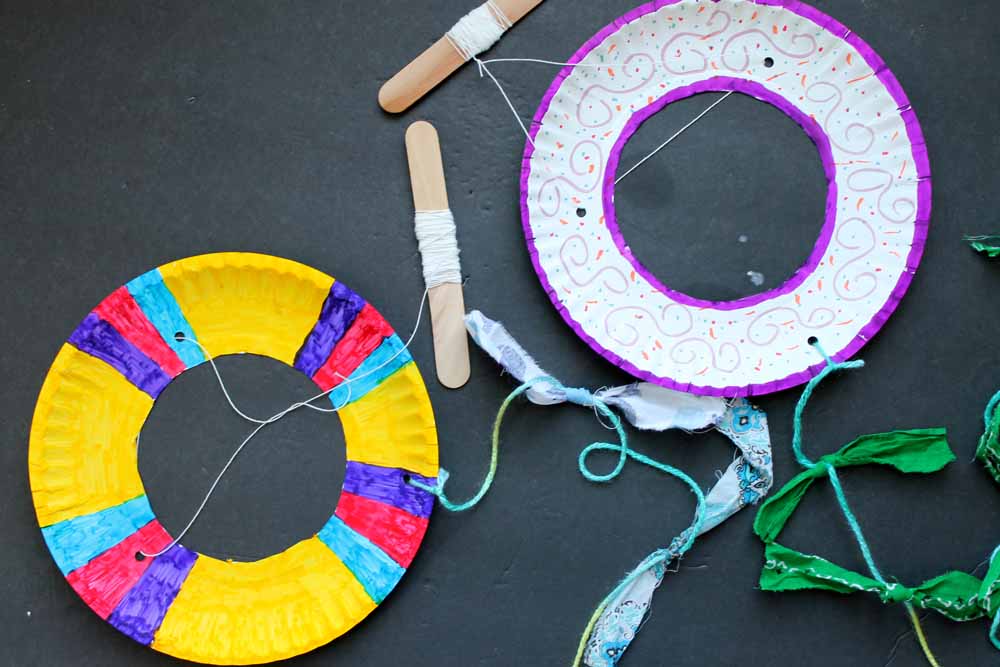 This paper plate kite craft is the perfect summer craft for kids