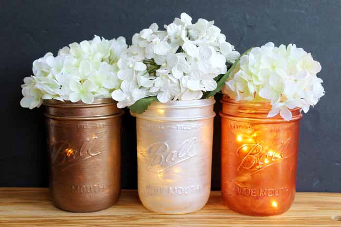 These mason jar wedding centerpieces are easy to make for your reception!