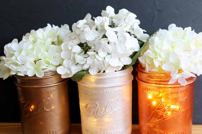These mason jar wedding centerpieces are easy to make for your reception!