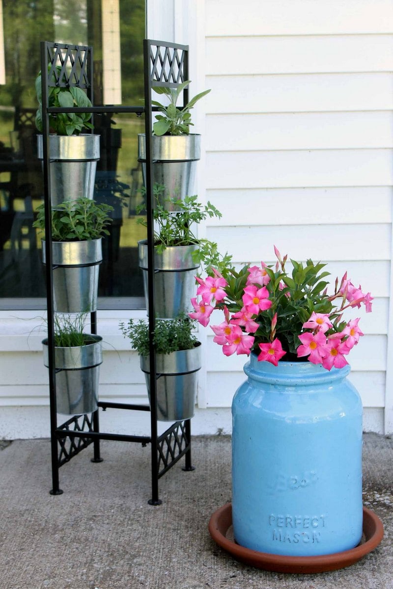 standing herb garden with a mason jar planter and pink flowers