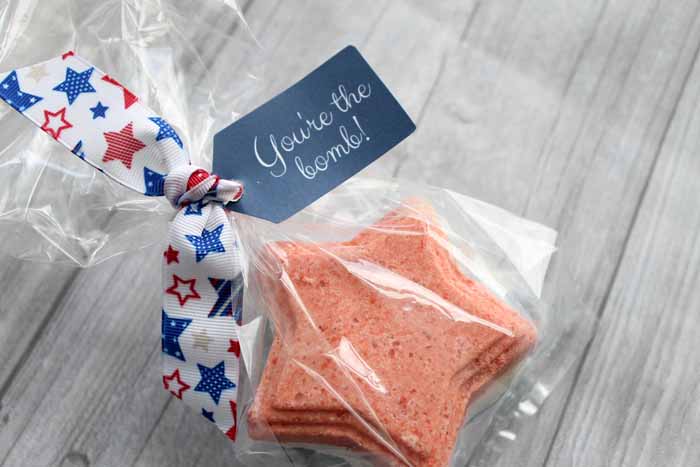 Gift-wrapped bath bombs with a tag
