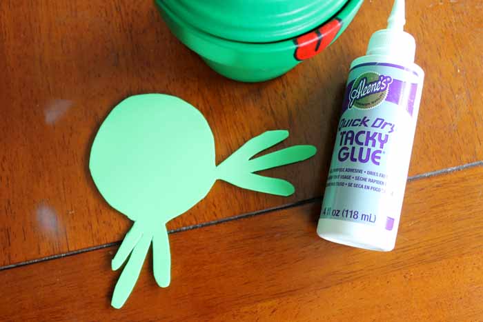 Cut the frog feet from the foam sheet, then attach with tacky glue