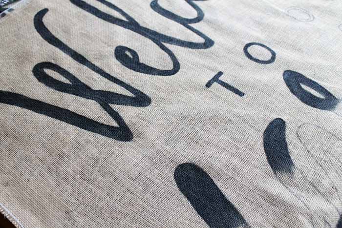 painting letters on burlap