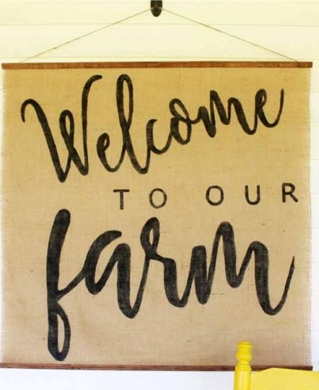 Make this handmade wall hanging with burlap! A great farmhouse style addition inside or outside of your home!