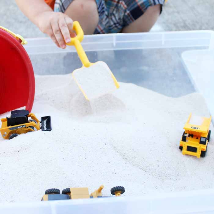 scoop and sand with toys