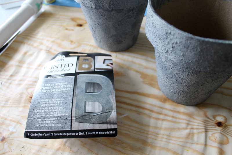 concrete planters on wood