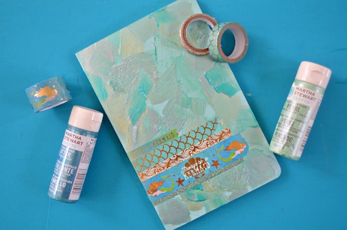 washi tape covered journal on turquoisese