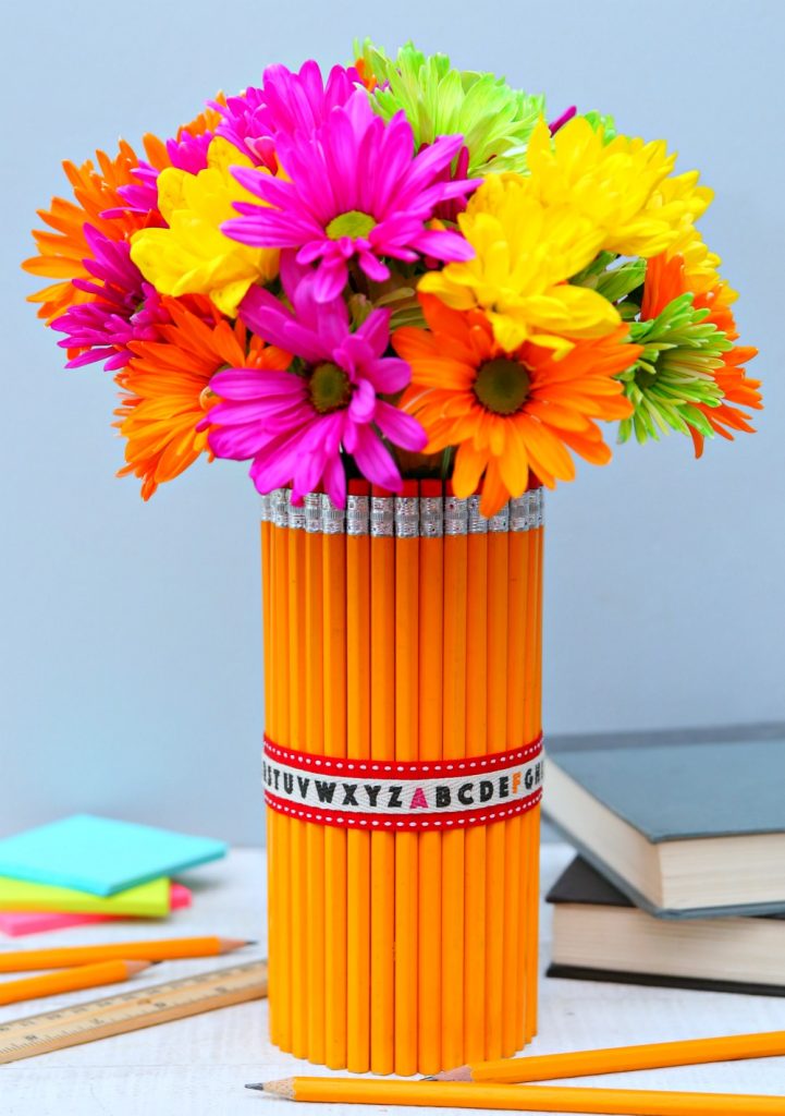 pencil vase with colorful flowers