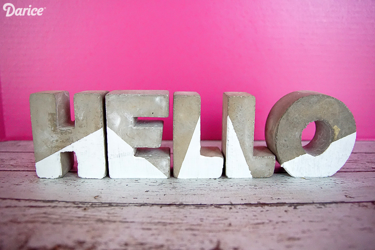 hello color blocked concrete letters with hot pink backdrop