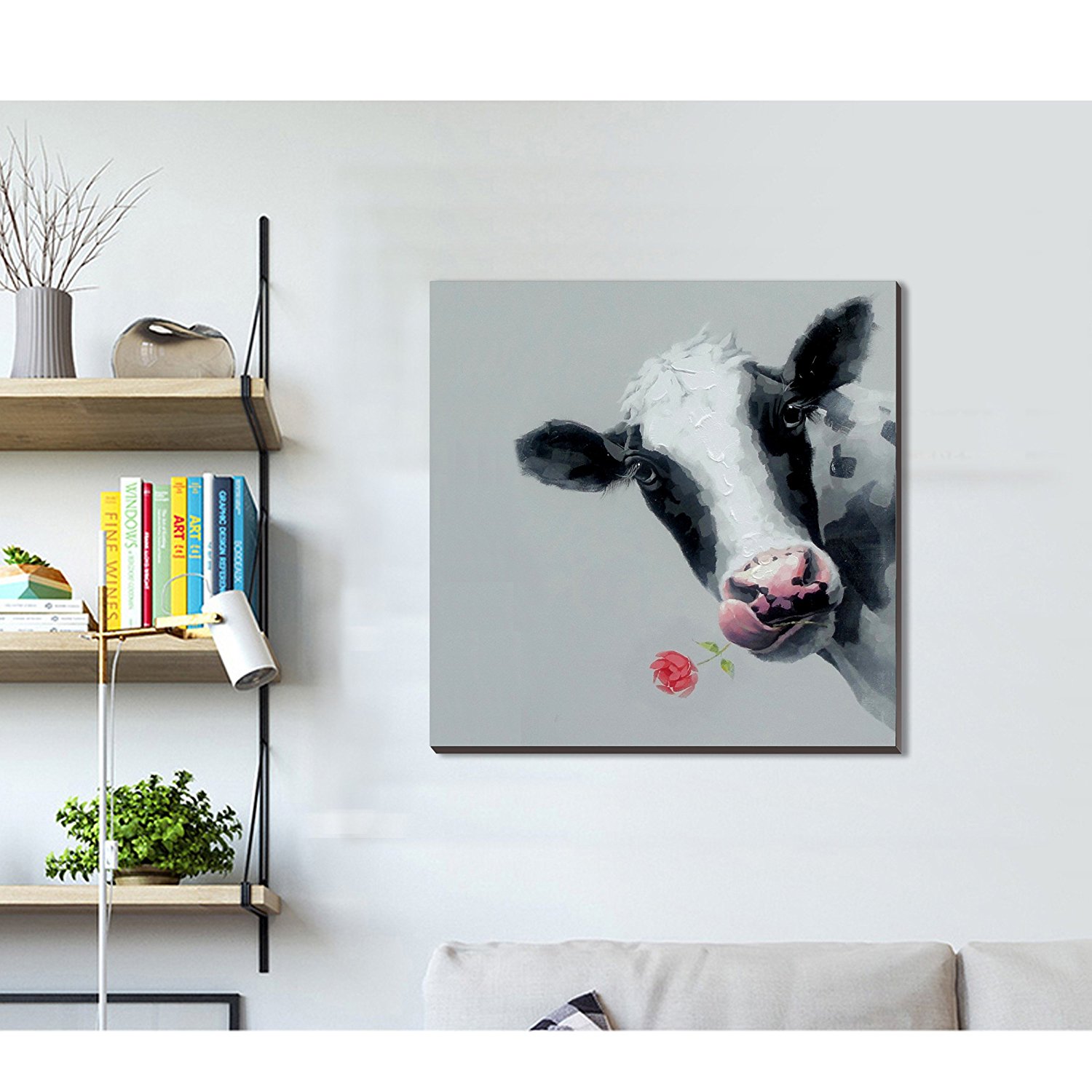 cow painting on grey, white wall with utility wall shelving