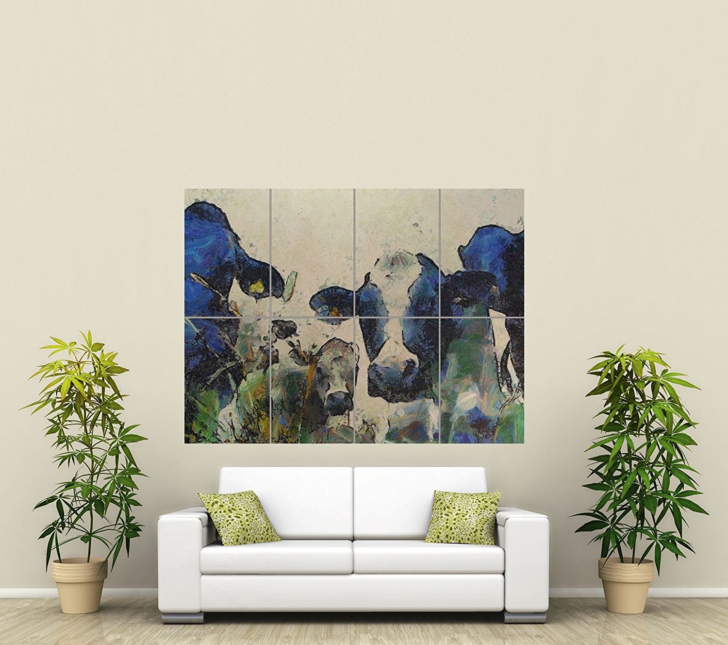 mosaic cow painting on beige wall with white couch, plants and green pillows