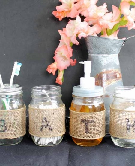 Make a mason jar bathroom set with burlap in this quick and easy tutorial!