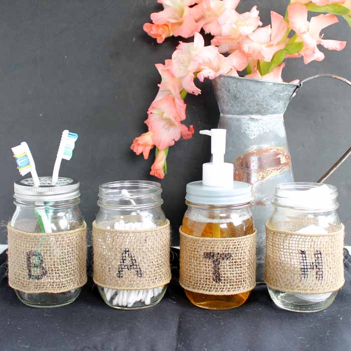 Mason jars used to organize bathroom 