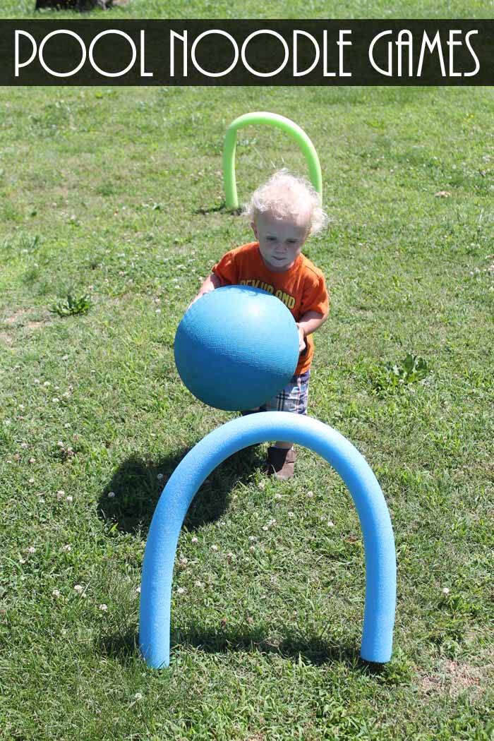small child carrying a kickball - pool noodle games pin image