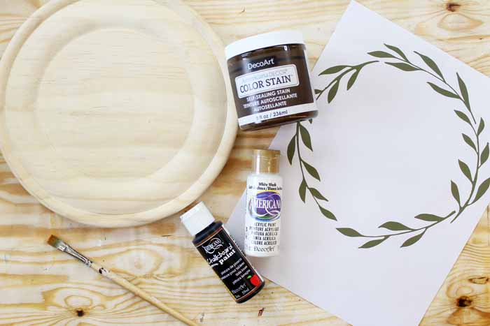 supplies to make a rustic chalkboard on top of a wooden backdrop