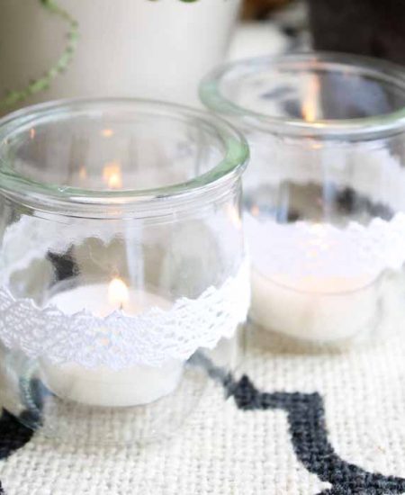 lace wrapped jars with candles