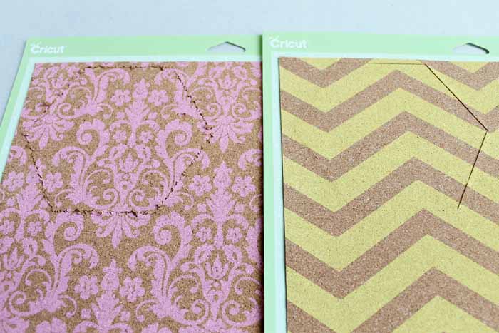 The Cricut Maker cut the zigzag lined cork much cleaner than the Explore cut the paisley material