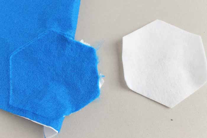 The Explore barely cut through the blue felt, but the Cricut Maker cleanly cut the white felt