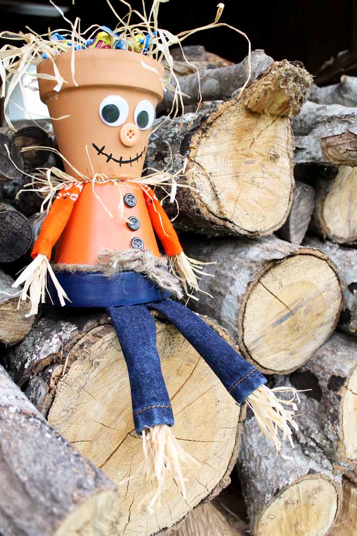 A fun clay pot scarecrow is the perfect way to welcome Trick or Treaters to your home!