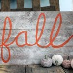 Learn how to make a barnwood sign with this quick and easy tutorial! A great faux paint finish to get that barn wood look!