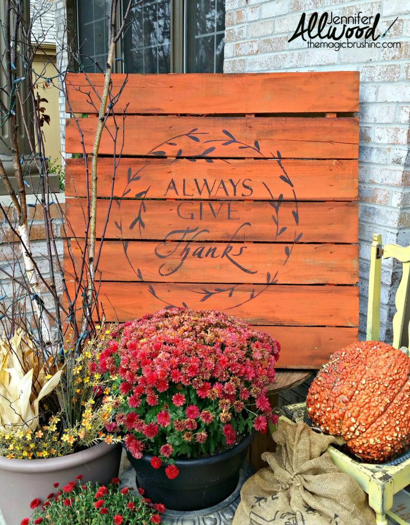 Give Thanks pallet sign with mums and a pumpkin