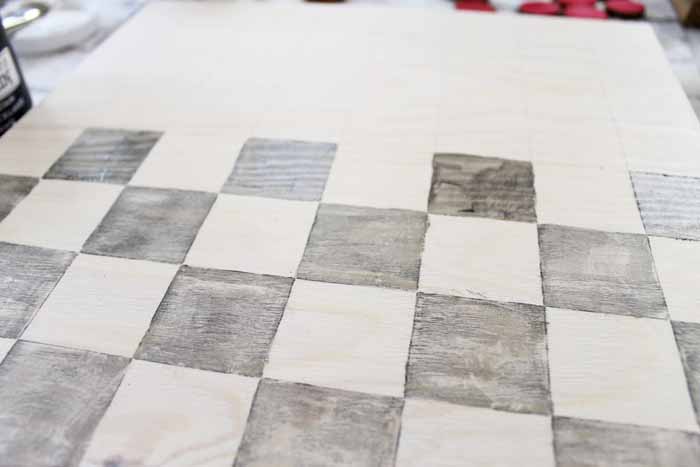 Staining alternate squares to make a checkerboard