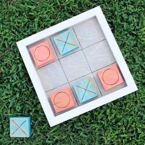 Outdoor yard games: Make a reversible game board for checkers and tic tac toe on the grass!