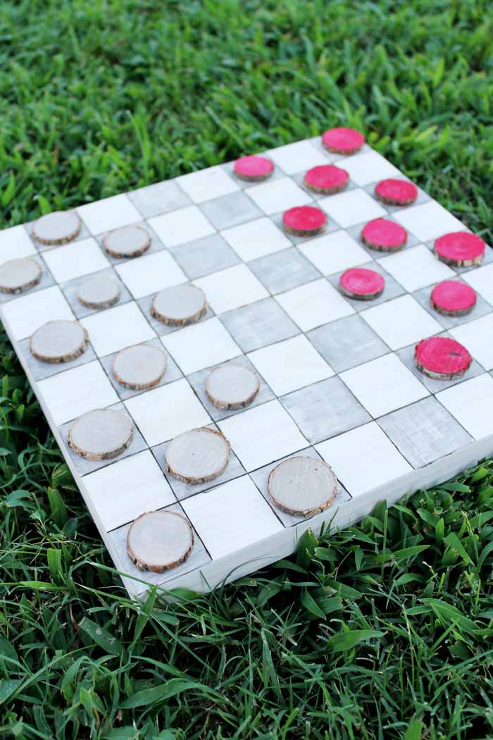 This outdoor checkers game board is perfect for some backyard family fun