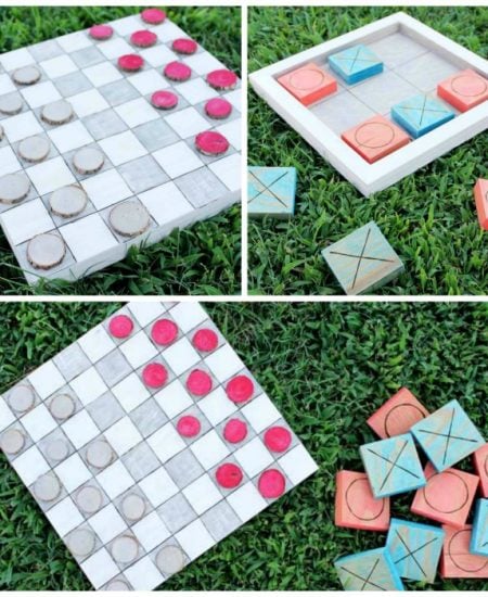 Close up of outdoor checkers and tic tac toe on grass backdrop