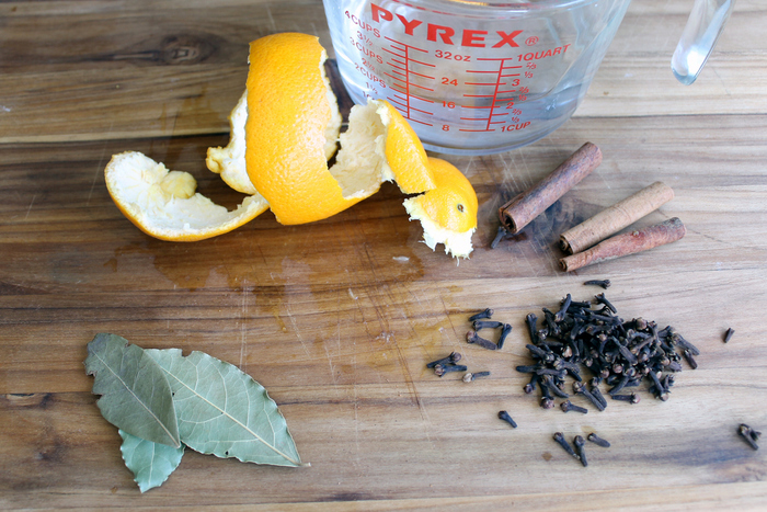 The orange spice fall stove simmer is a fragrant combination of orange peel, basil, cinnamon, and clove