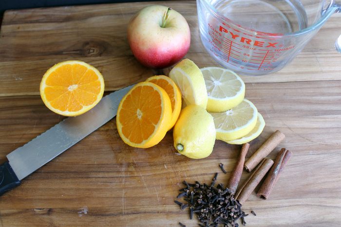 This citrus simmer pot recipe uses orange, lemon, apple, and clove