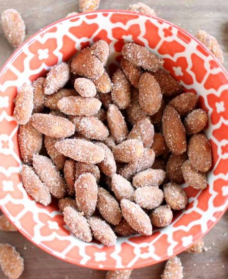 Orange and white floral bowl with spiced almonds