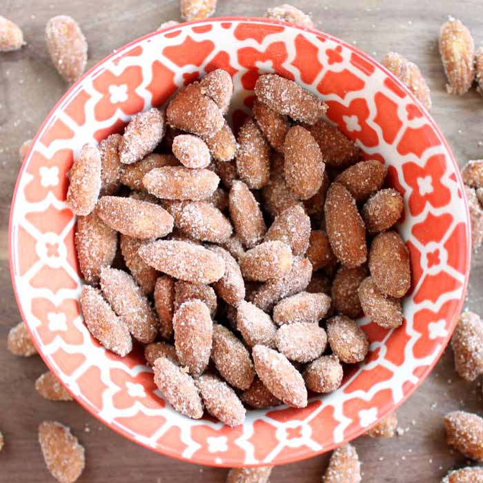 Orange and white floral bowl with spiced almonds