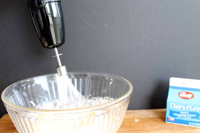 mixing cookie dough for Snickerdoodle and Buttercream cookies