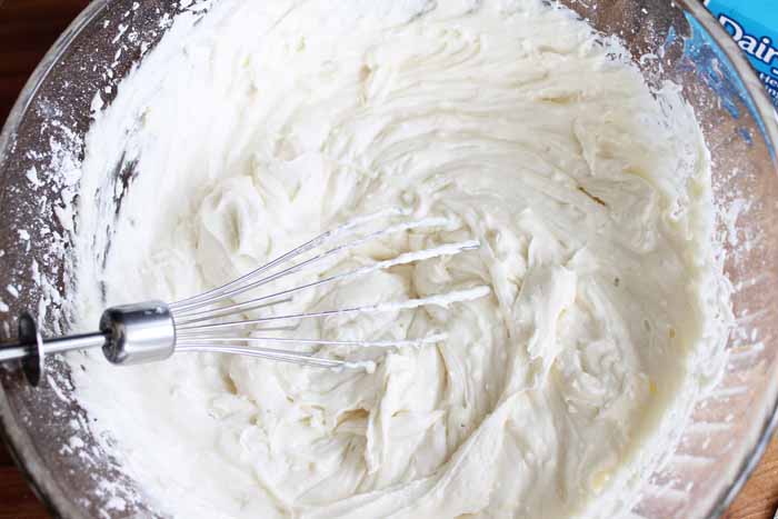 Whisking cookie batter for snickerdoodle cookies