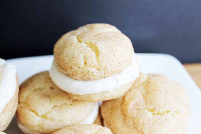 Close up of snickerdoodle whoopie pie with a black backdrop