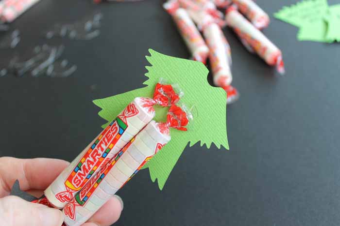 using glue dots to hold candy to cardstock