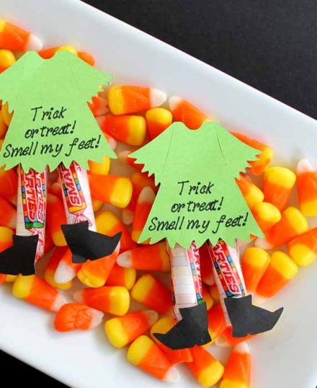 Need Halloween candy ideas? Try making these witch legs for a creative Halloween treat!