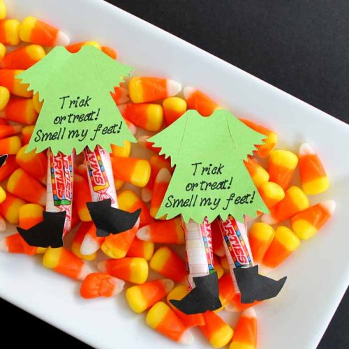 Need Halloween candy ideas? Try making these witch legs for a creative Halloween treat!